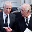 Britain's Prince Andrew speaks with King Charles 